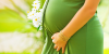 pregnant-woman-in-green.png